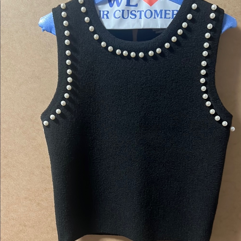 Black Sleeveless Top with Pearl Accents
